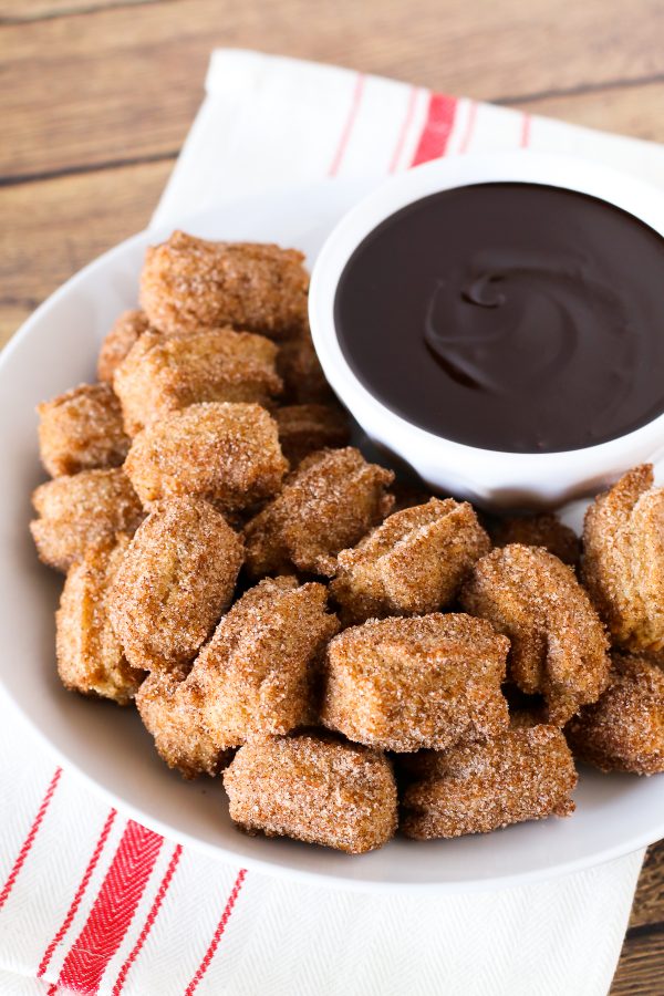 Gluten Free Vegan Churro Bites with Chocolate Sauce. Bite-size fried churros, dipped in a creamy chocolate sauce. You can’t dip just one!