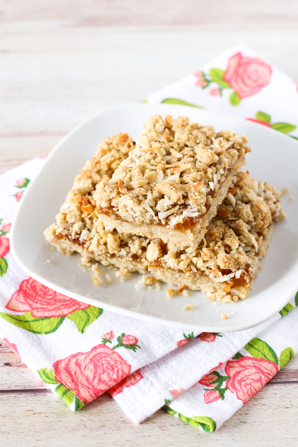 Gluten Free Vegan Apricot Coconut Crumb Bars. Coconut oat crumble with a layer of sweet apricot jam. You can’t eat just one of these easy-to-make bars!