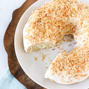 Gluten Free Vegan Coconut Bundt Cake. Give me all the coconut! Coconut cake with a simple frosting and covered in toasted coconut.