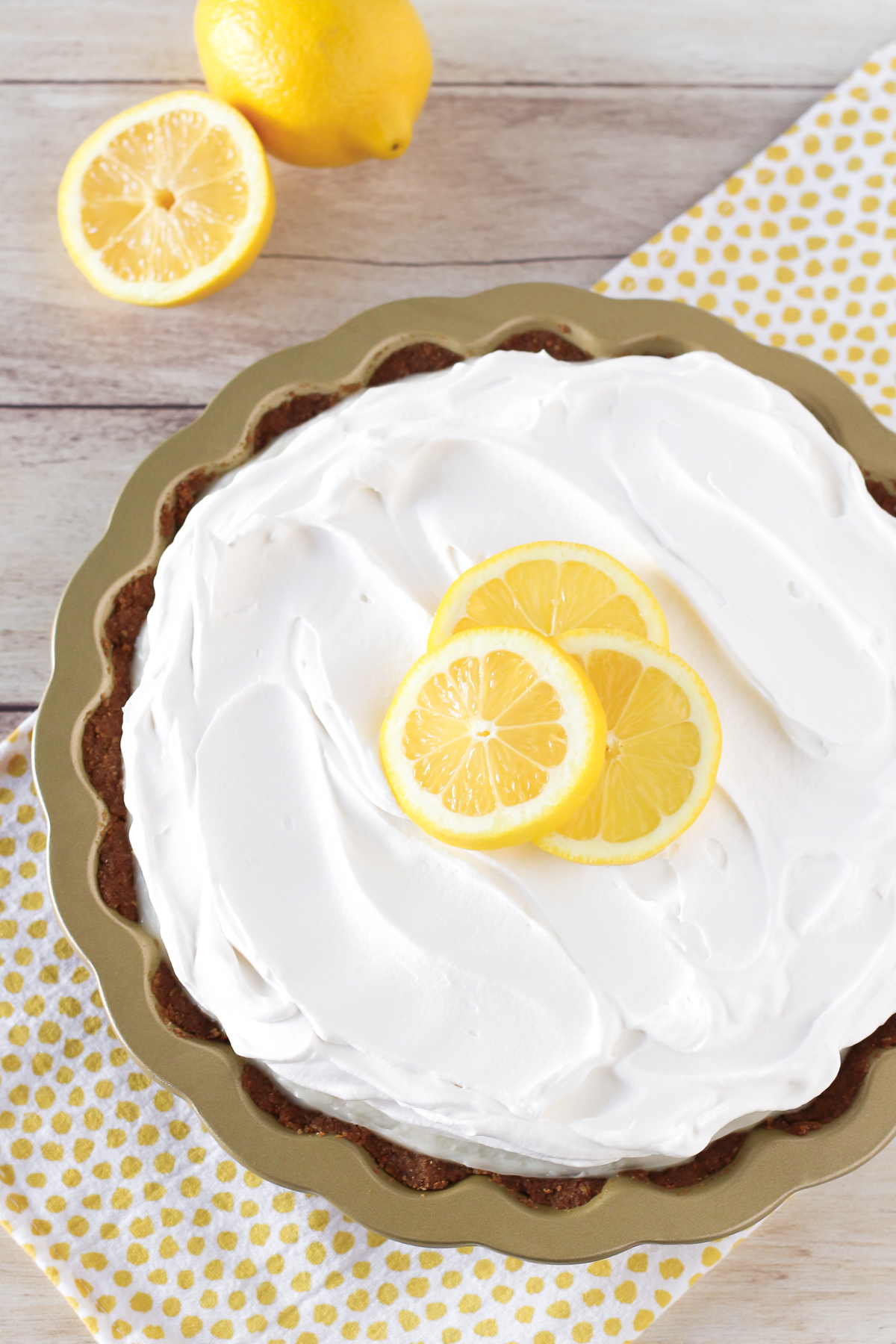 Gluten Free Vegan Lemon Cream Pie. Creamy, dreamy lemon filling in a graham cracker crust. A luscious lemon pie!