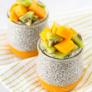 Dairy Free Mango Chia Pudding. Layers of fresh mango puree, vanilla chia seed pudding and fresh fruit. A tropical treat!