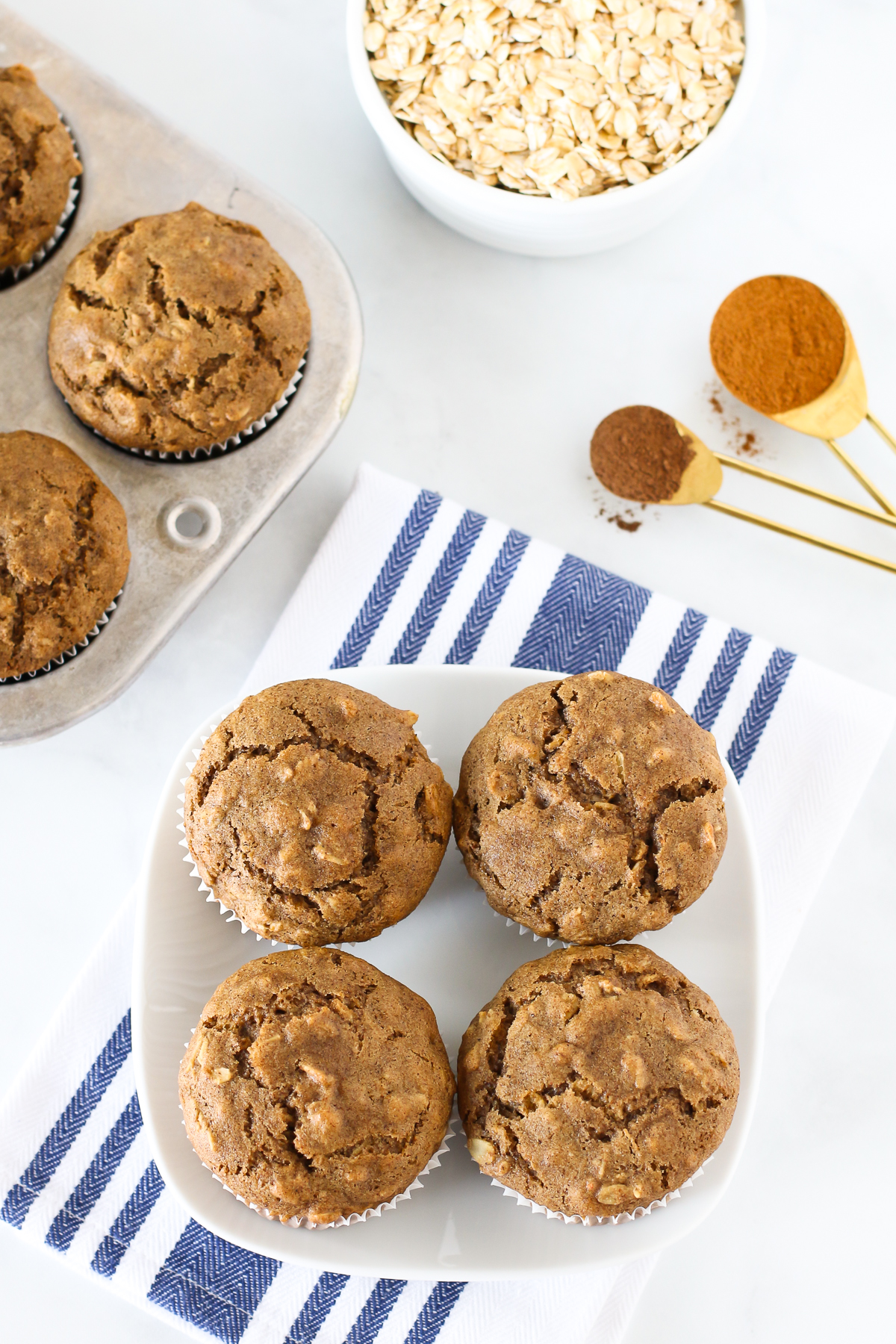 Gluten Free Vegan Oatmeal Spice Muffins. These tender muffins are filled with oats and warm spices, making them a lovely morning treat.