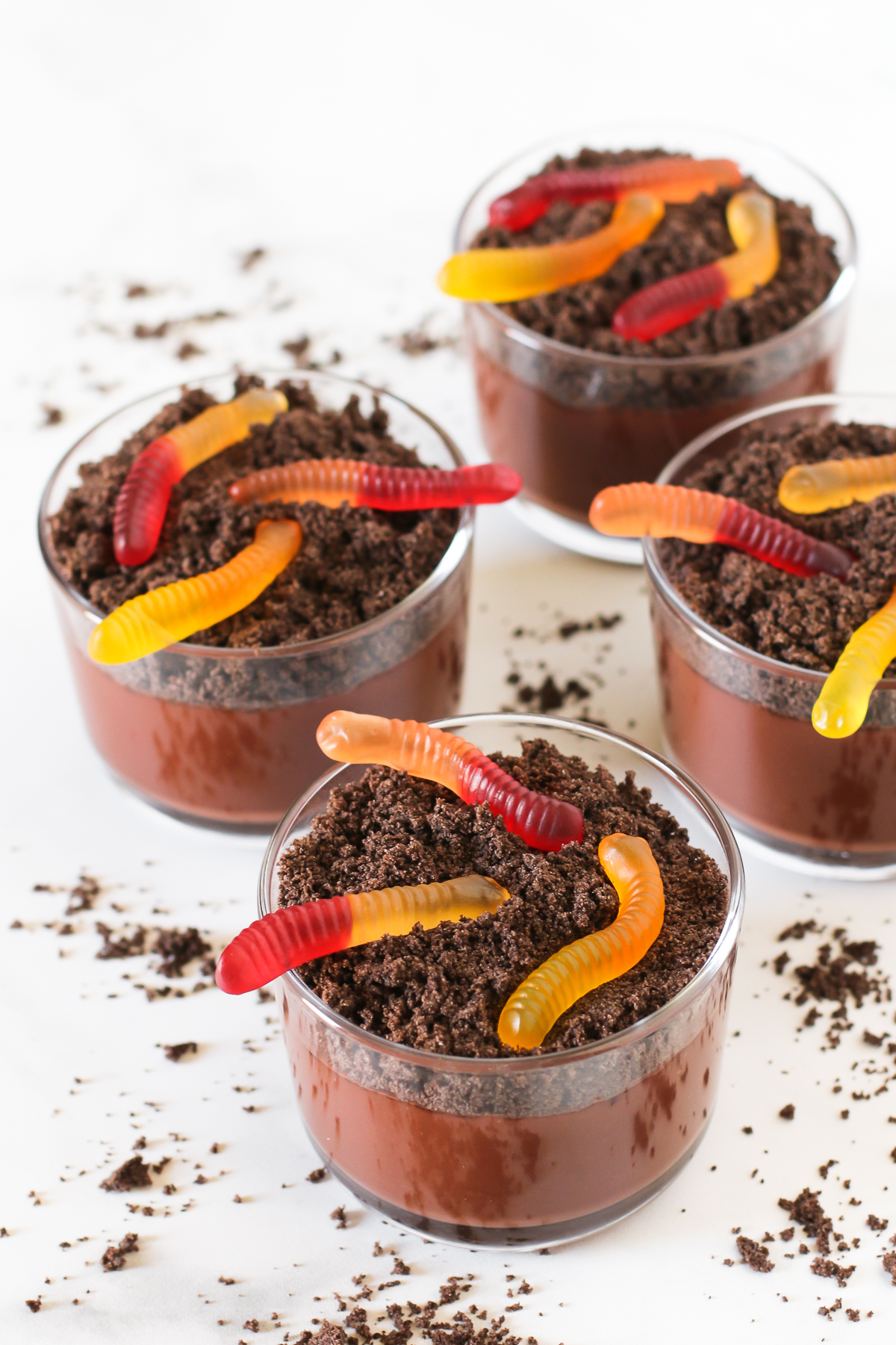 Gluten Free Dairy Free Dirt Cups. Creamy chocolate pudding topped with crushed chocolate cookie dirt. Can’t forget the gummy worms!