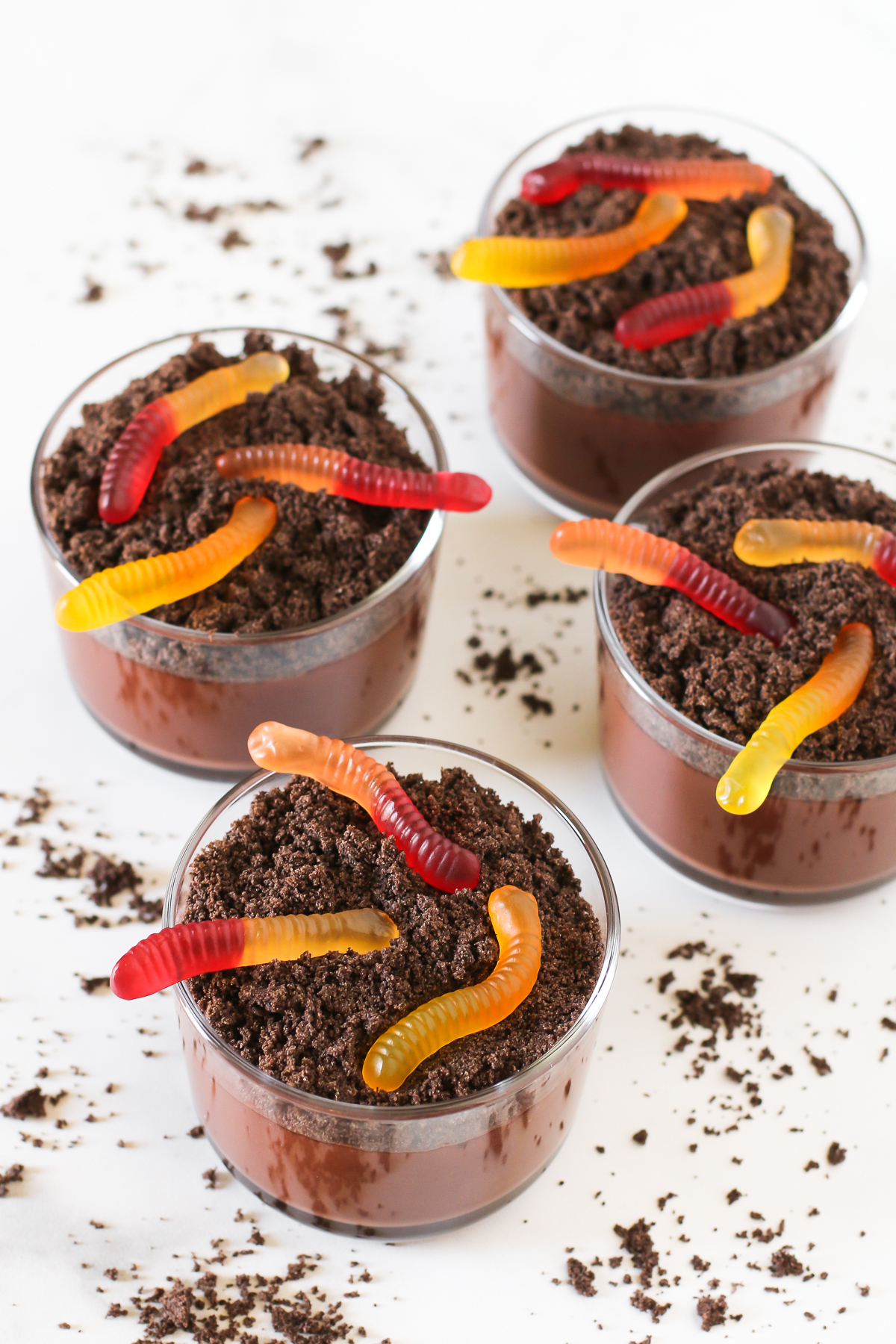 Gluten Free Dairy Free Dirt Cups. Creamy chocolate pudding topped with crushed chocolate cookie dirt. Can’t forget the gummy worms!