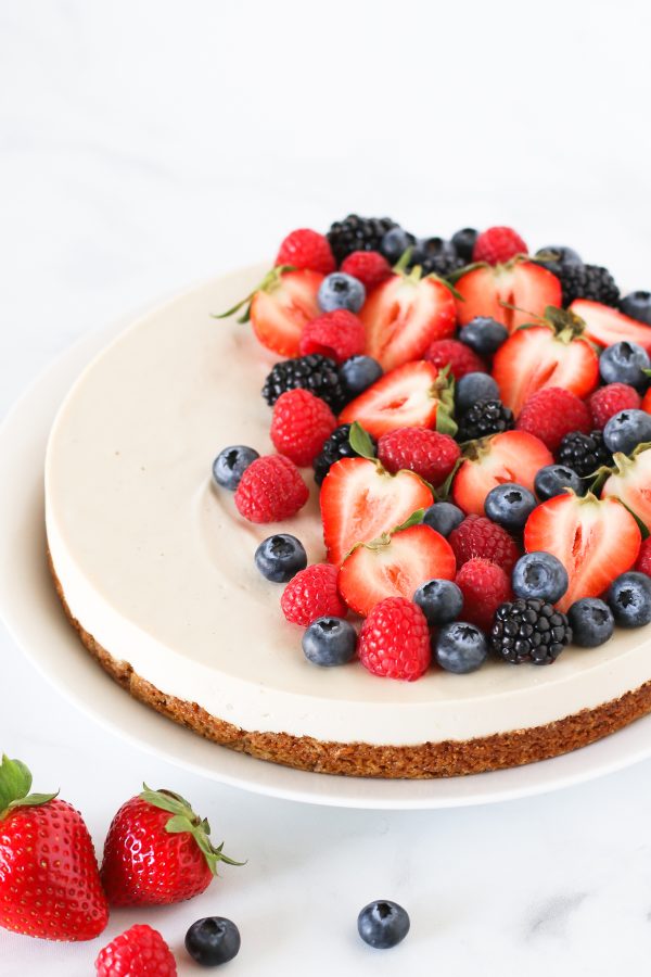 Gluten Free Vegan Berry Cheesecake. You will go head over heals for this dairy free cheesecake! Made with cashews, the creamy texture is perfectly paired with the fresh berries.