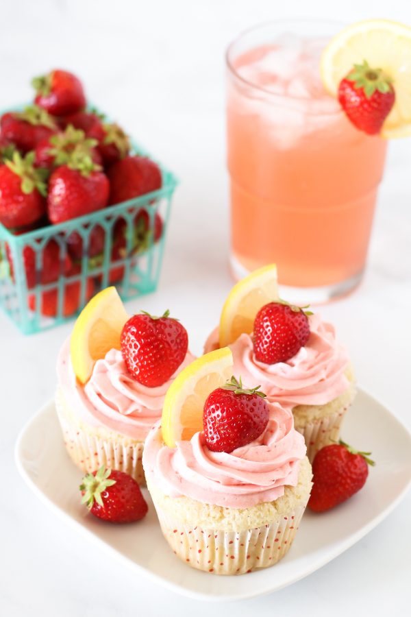 Gluten Free Vegan Strawberry Lemonade Cupcakes. Light, fluffy lemon cupcakes with a fresh strawberry buttercream. Tastes like summer!