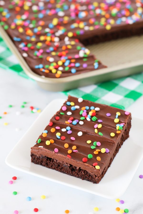 Gluten Free Vegan Chocolate Frosted Brownies. What could be better than a fudgy, chocolate frosted brownie with colorful sprinkles?