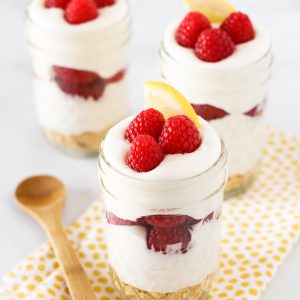 Gluten Free Vegan Raspberry Lemon Cream Parfaits. Layers of light, dairy free lemon cream and fresh, sweet raspberries.