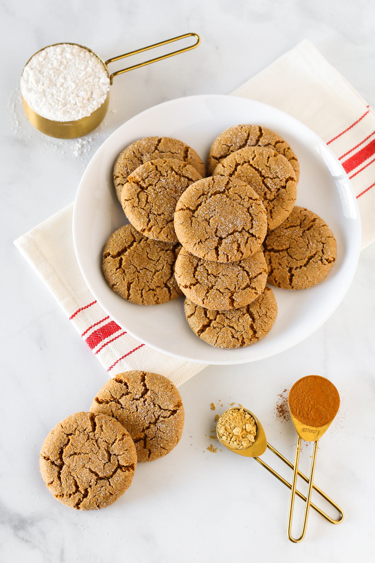 Gluten Free Vegan Molasses Cookies. Soft, chewy and perfectly spiced. A plate of these cookies is sure to be a hit at any holiday party!