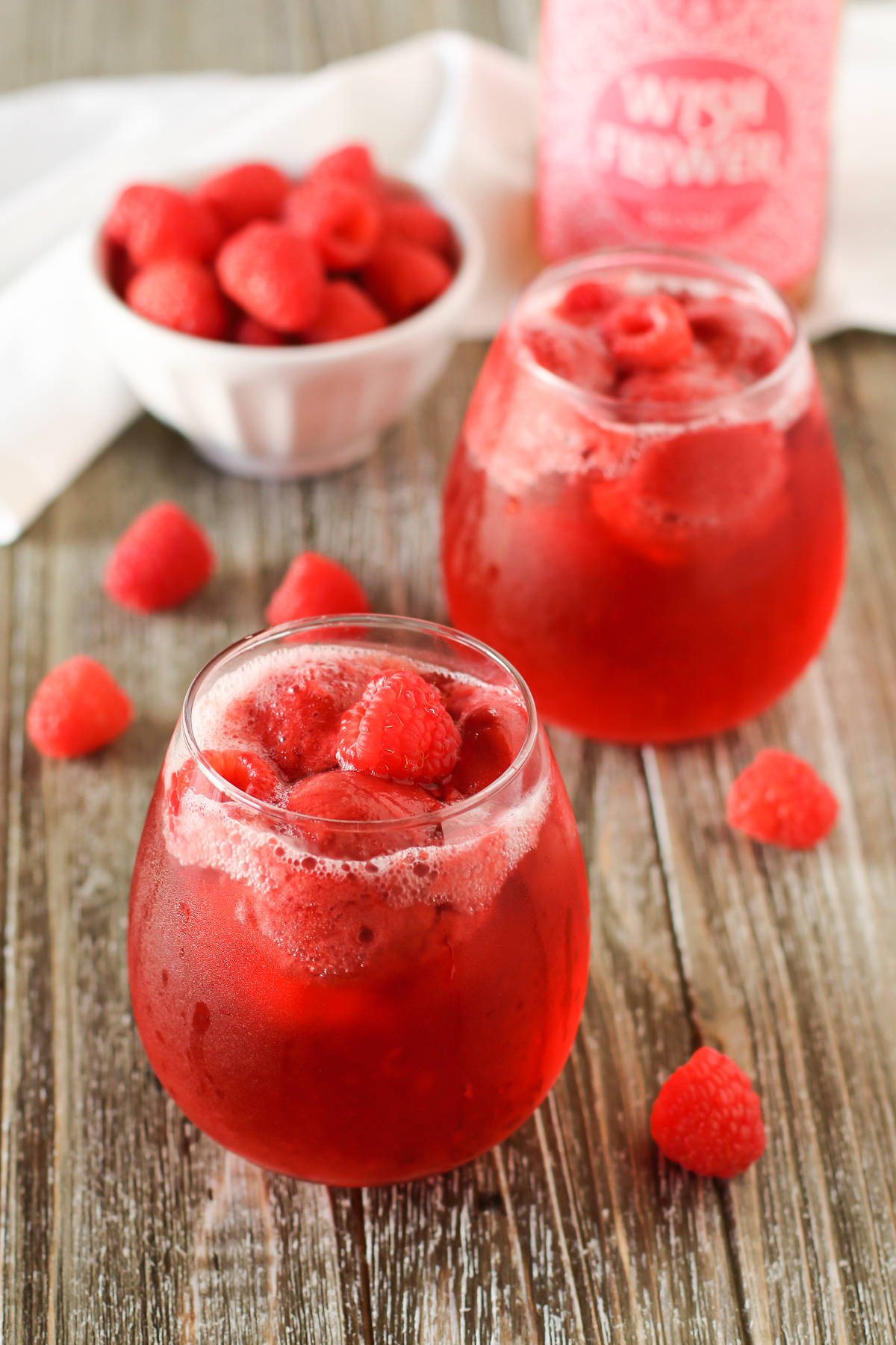 Raspberry Sorbet Rosé Floats. Raspberry sorbet and sparkling rosé wine, topped with fresh raspberries. Perfect for Valentine’s Day or a girls night!