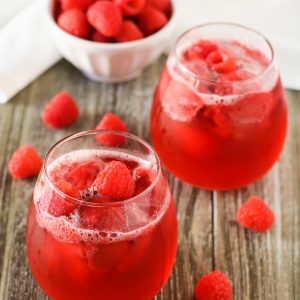 Raspberry Sorbet Rosé Floats. Raspberry sorbet and sparkling rosé wine, topped with fresh raspberries. A berry sweet drink!