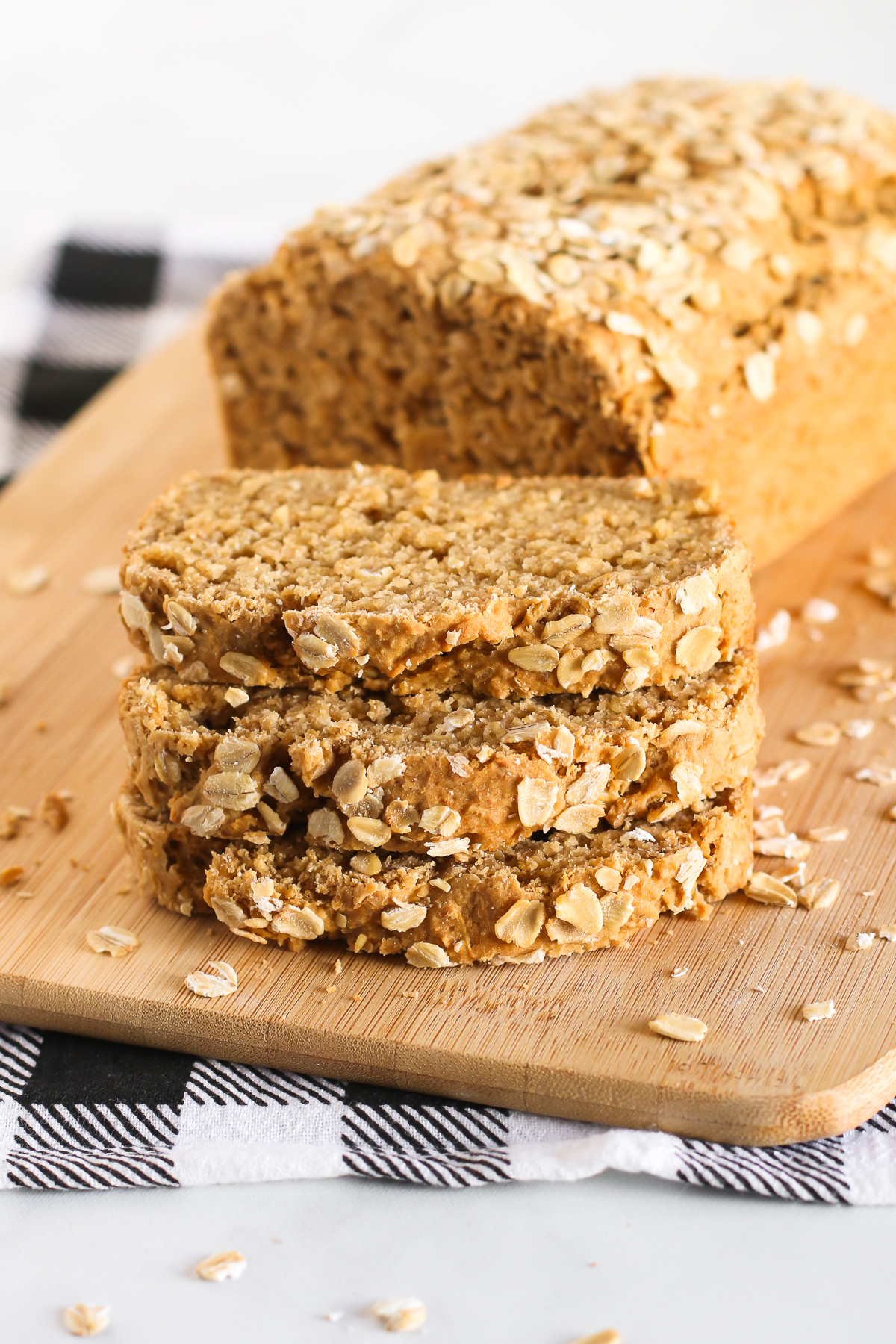 Gluten Free Vegan Oatmeal Quick Bread. Slices of soft oat bread, ready for your favorite jam or nut butter!