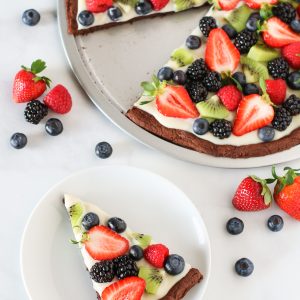 Gluten Free Vegan Brownie Fruit Pizza. Chocolate brownie crust with a cream cheese frosting, loaded with fresh fruit. A beautiful dessert pizza!