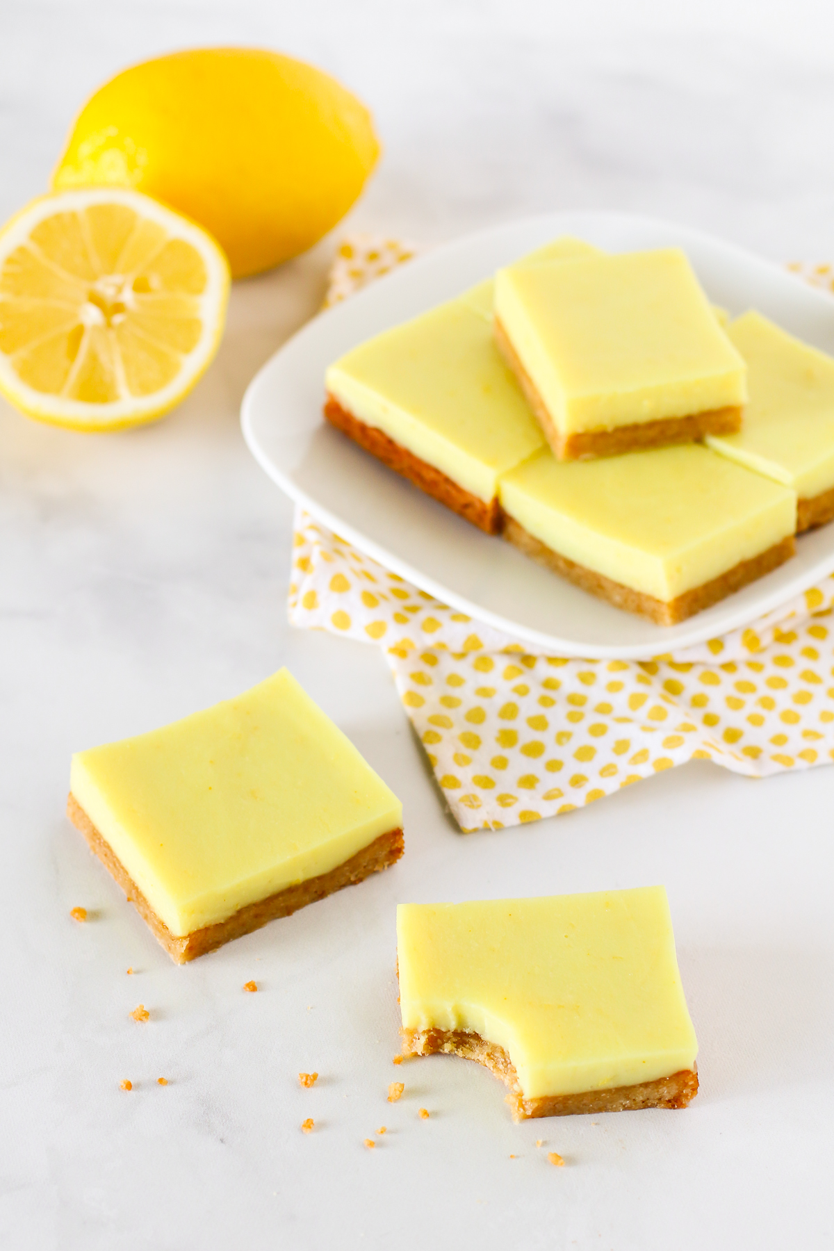 Gluten Free Vegan Lemon Bars. Chewy almond crust with a layer of creamy lemon deliciousness make these lemon bars simply irresistible!