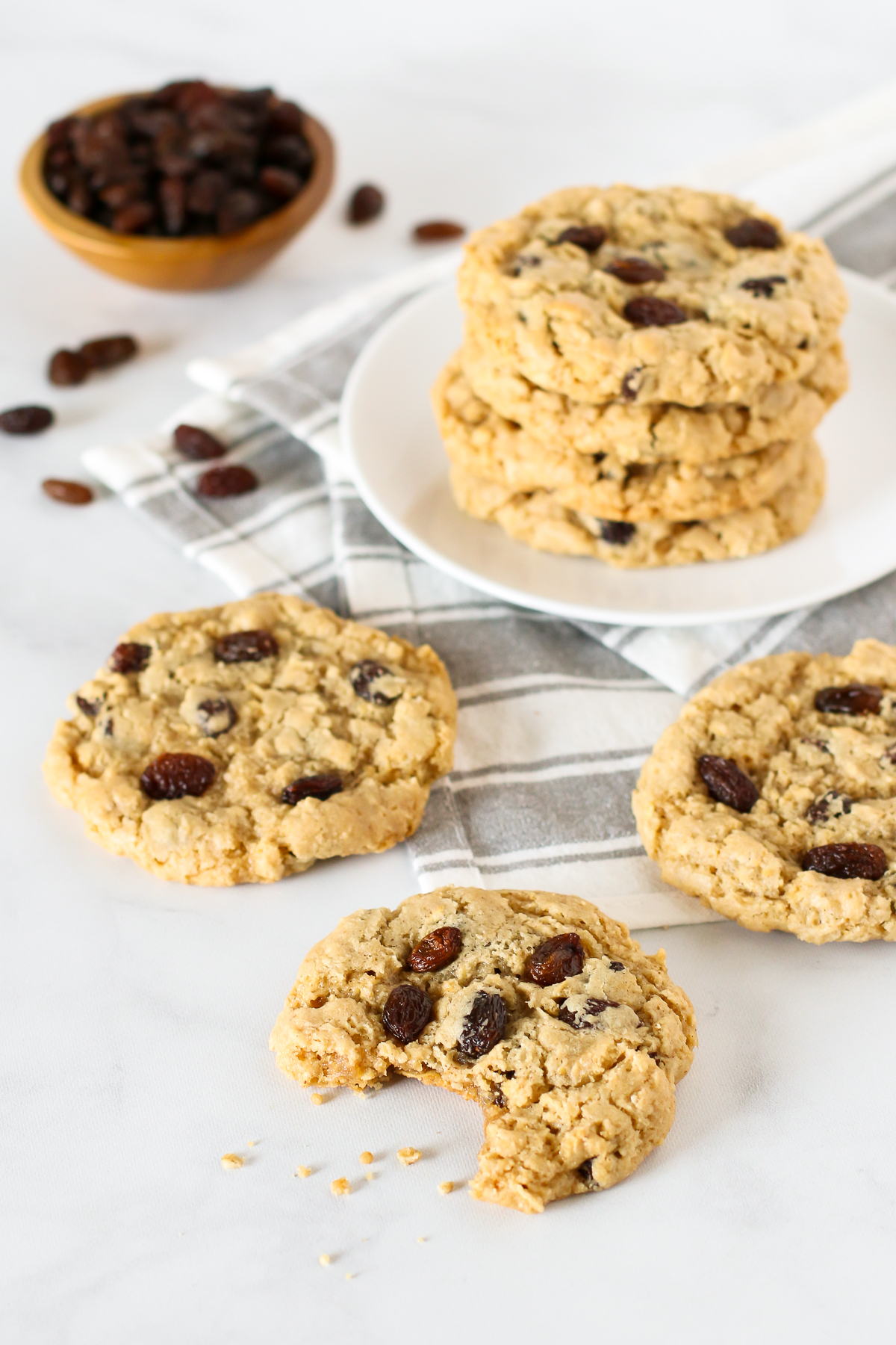 Gluten Free Vegan Oatmeal Raisin Cookies. Chewy oatmeal cookies, with a touch of cinnamon and the perfect amount of sweet raisins.