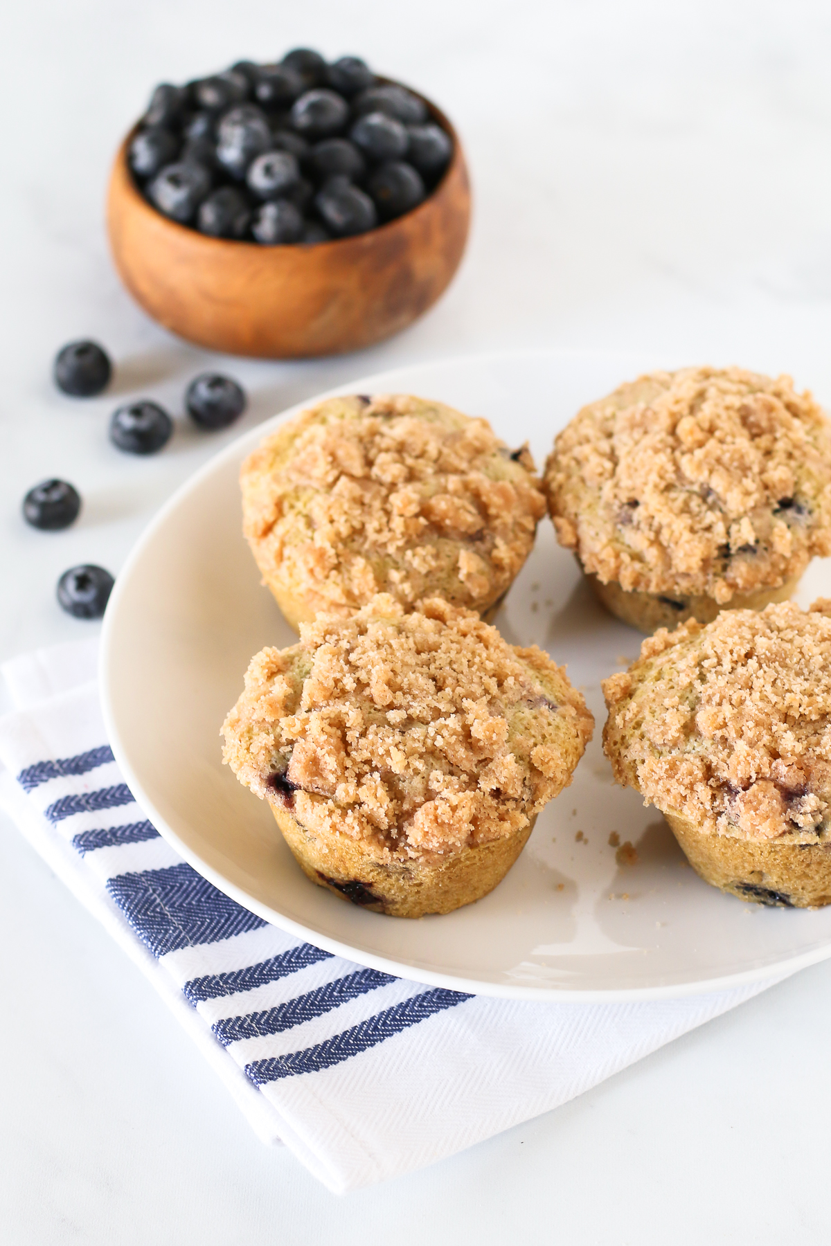 Gluten Free Vegan Blueberry Crumb Muffins. The beautiful cinnamon crumb topping makes these blueberry muffins simply delightful!