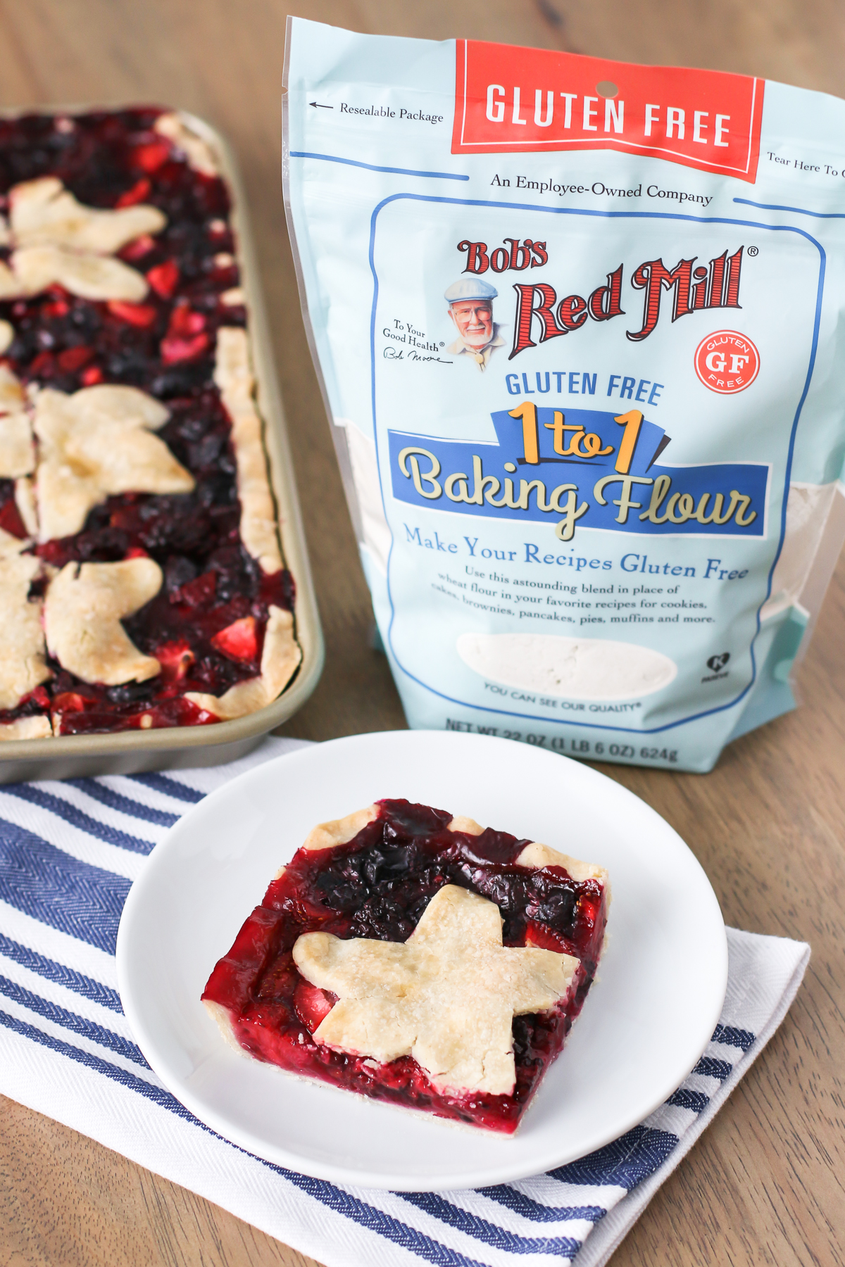 Gluten Free Vegan Triple Berry Slab Pie. Flaky crust, made with Bob’s Red Mill gluten free 1-to-1 baking flour, is filled with fresh berries and baked until bubbly perfection.