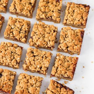 Gluten Free Vegan Peanut Butter and Jelly Oat Bars. The classic combination of creamy peanut butter and strawberry jelly in a oat crumb bar. What’s not to love?