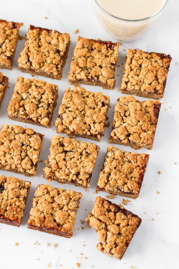 Gluten Free Vegan Peanut Butter and Jelly Oat Bars. The classic combination of creamy peanut butter and strawberry jelly in a oat crumb bar. What’s not to love?