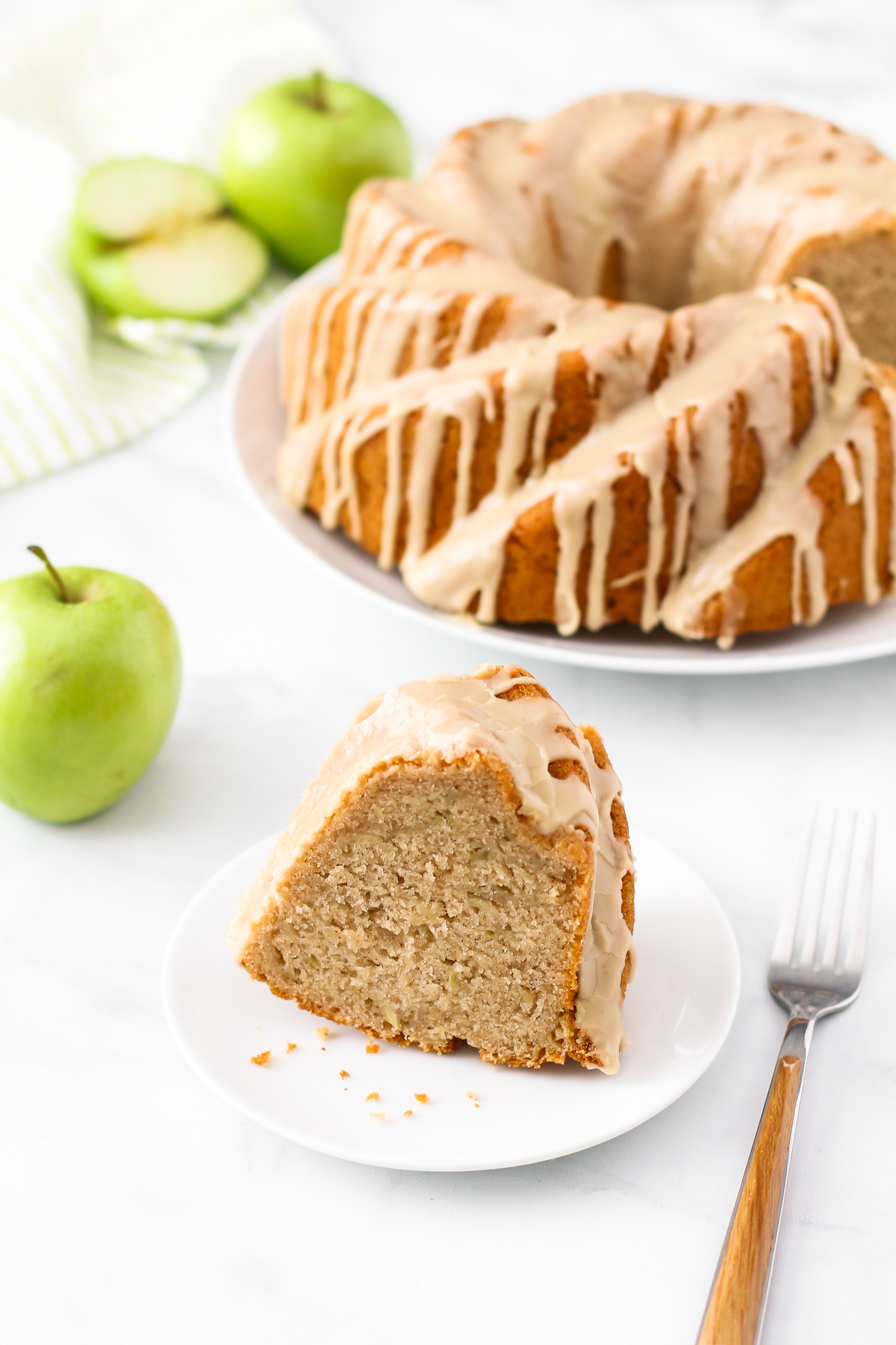 Gluten Free Vegan Caramel Apple Bundt Cake. As the decadent caramel glaze is dripping down the sides of this gluten free vegan caramel apple bundt cake, you can’t help but want a slice.