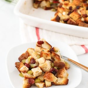 Gluten Free Apple Cranberry Stuffing. This sweet and savory stuffing is sure to be a hit on your Thanksgiving table!