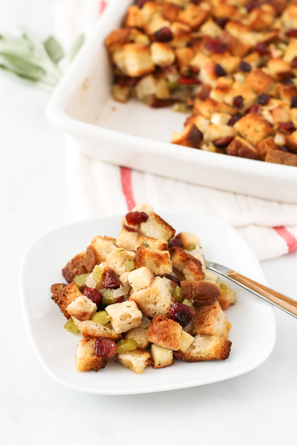 Gluten Free Apple Cranberry Stuffing. This sweet and savory stuffing is sure to be a hit on your Thanksgiving table!