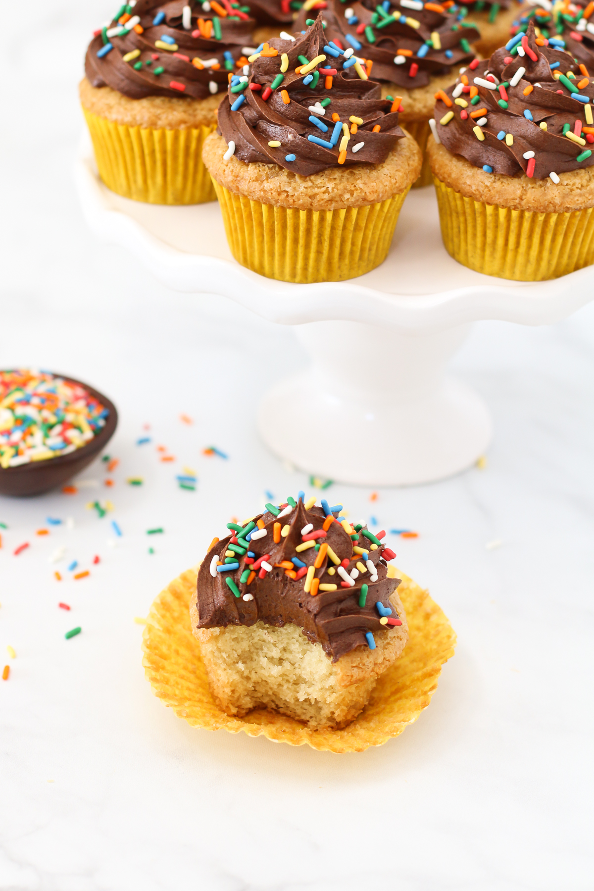 Gluten Free Vegan Vanilla Cupcakes with Chocolate Frosting. The classic chocolate-vanilla combo is sure to make your cupcake dreams come true! 