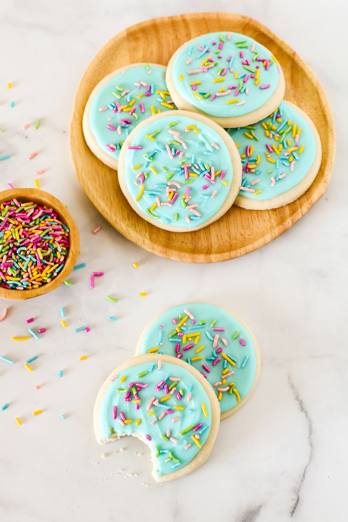 Gluten Free Vegan Frosted Sugar Cookies. The perfect rolled and cutout sugar cookies, with a simple vanilla frosting. A classic cookie for any occasion!