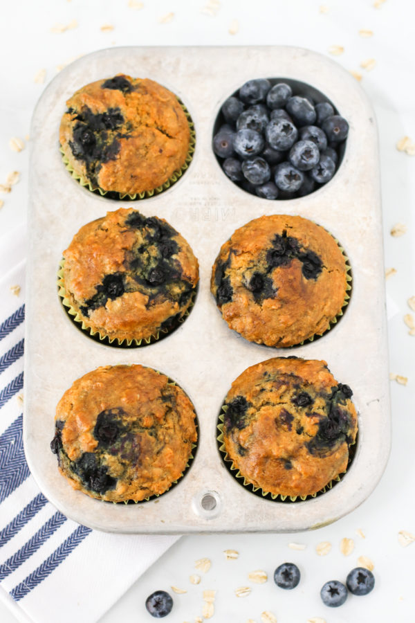 Gluten Free Vegan Blueberry Oatmeal Muffins. Hearty oatmeal muffins, bursting with sweet blueberries. Quite the morning treat!