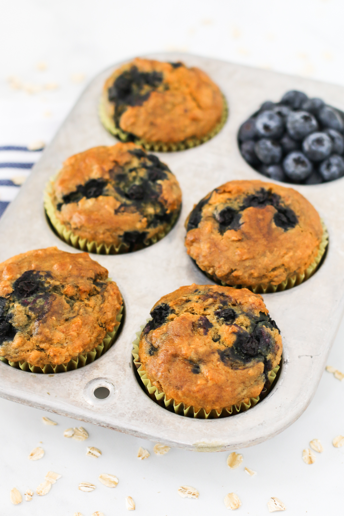 Gluten Free Vegan Blueberry Oatmeal Muffins. Hearty oatmeal muffins, bursting with sweet blueberries.