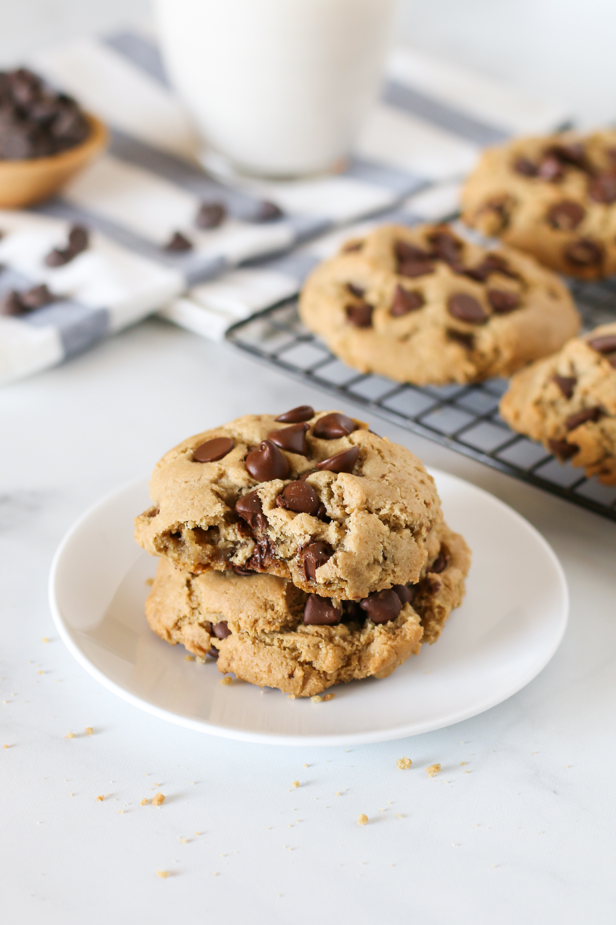 Gluten Free Vegan Big Fat Chocolate Chip Cookies. Loaded with chocolate chips, gooey on the inside and crispy on the edges. Chocolate chip cookie perfection!