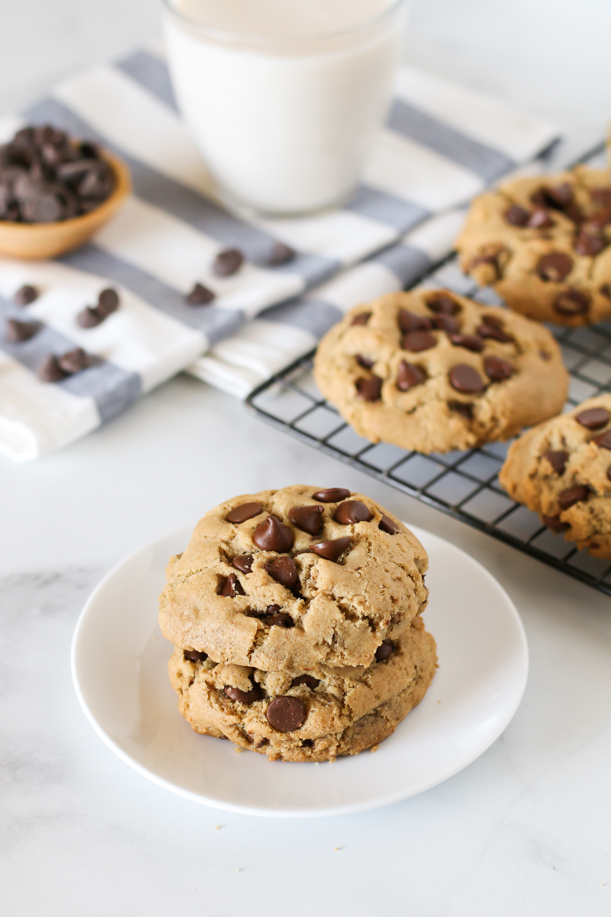 Gluten Free Vegan Big Fat Chocolate Chip Cookies. Loaded with chocolate chips, gooey on the inside and crispy on the edges. Chocolate chip cookie perfection!