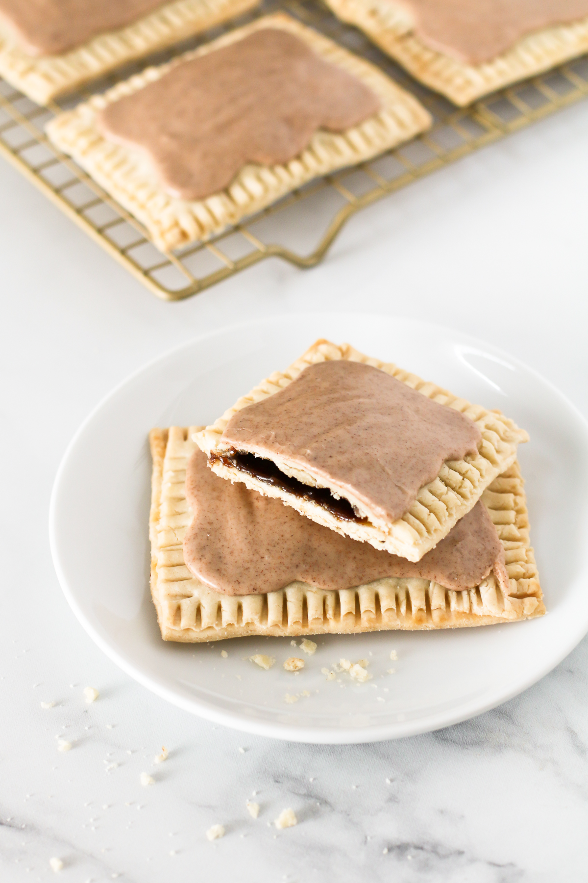 Gluten Free Vegan Brown Sugar Cinnamon Pop Tarts. Buttery pastry, with a cinnamon sugar filling and covered in a sweet cinnamon glaze. 