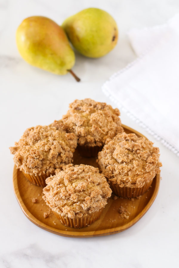 Gluten Free Vegan Pear Crumb Muffins. Tender, spiced muffins with diced fresh pears. A lovely fall breakfast treat!