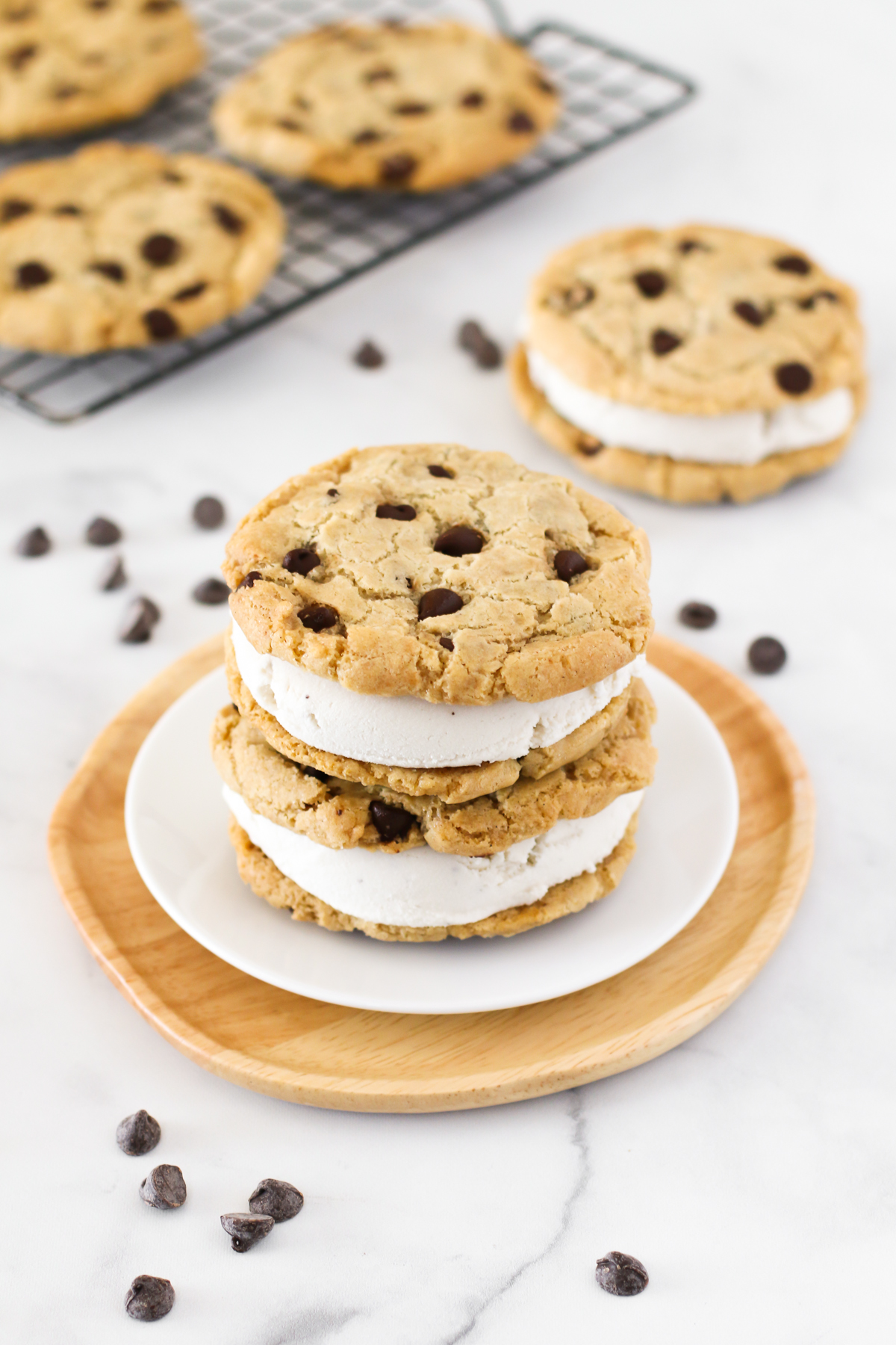 Gluten Free Vegan Chocolate Chip Cookie Ice Cream Sandwiches. Creamy vanilla ice cream, sandwiched between two chocolate chip cookies. What could be better?